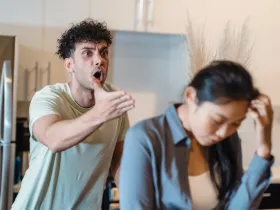 A man shouting at a woman